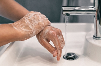 Image of washing both hands with soap